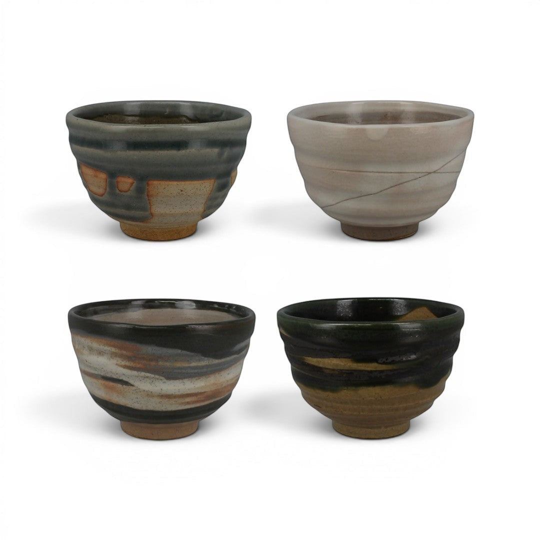 Set de quatre bols à riz Yugen lab en céramique artisanale Mino, style wabi-sabi avec émaux terreux et ardoise.