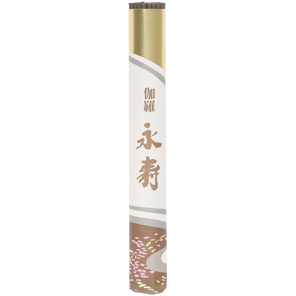 Rouleau d'encens Kyara au bois d'aloès avec emballage rose et doré.