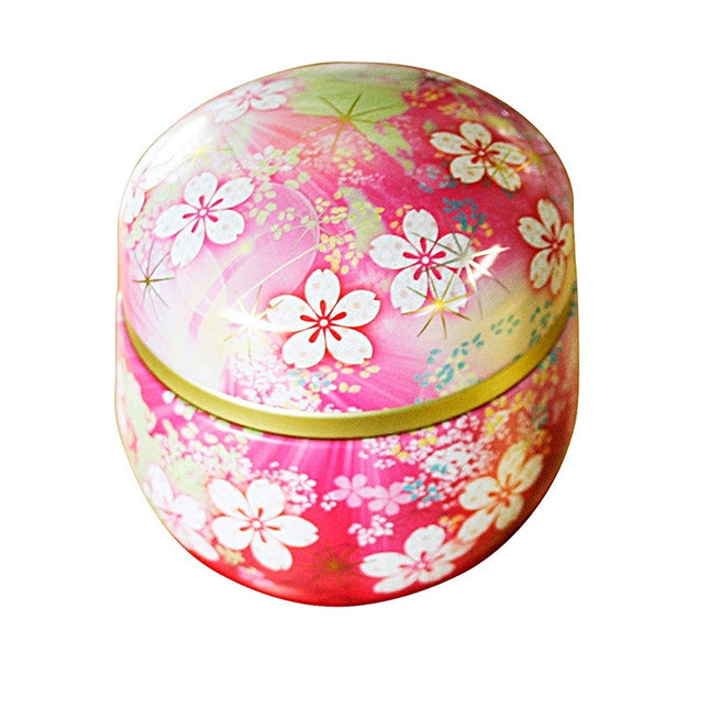 Tinplate tea caddy with floral designs