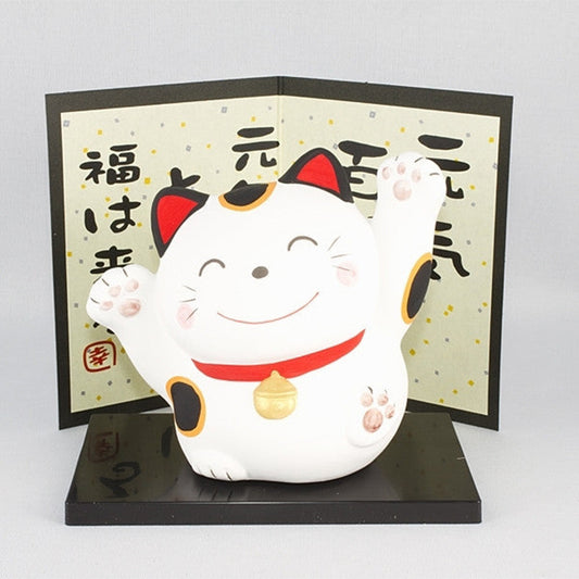 Maneki neko bell piggy bank in Japanese porcelain