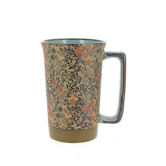 Single large stoneware mug with floral patterns