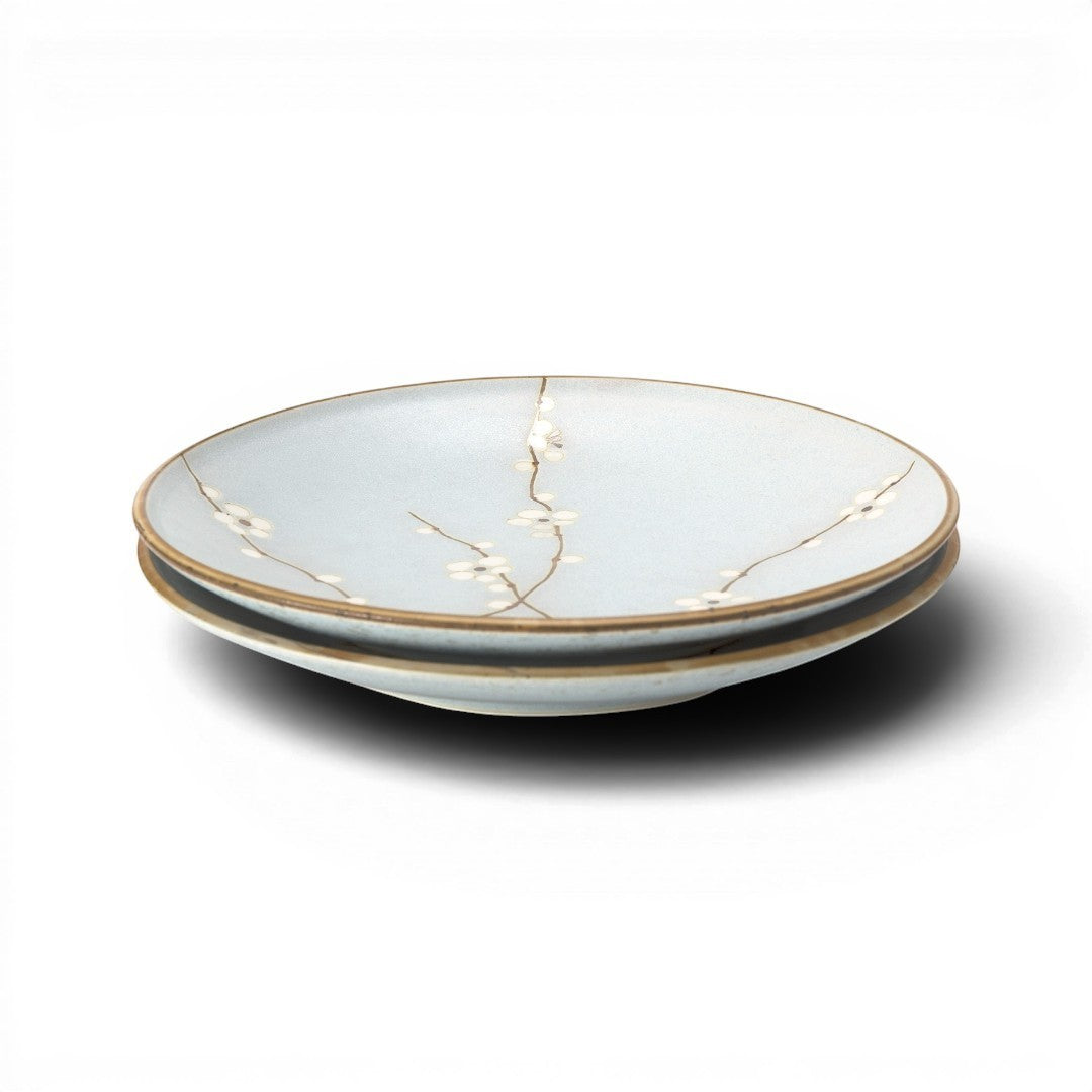 Set de 2 assiettes Yugen lab bleu clair en céramique avec motif de fleurs de cerisier japonaises délicates