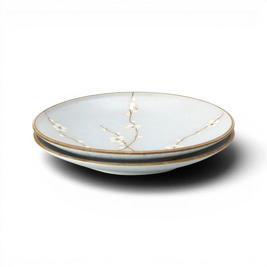Set de 2 assiettes Yugen lab bleu clair en céramique avec motif de fleurs de cerisier japonaises délicates