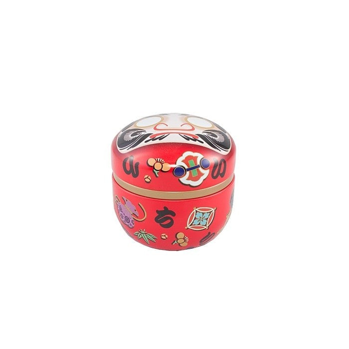 Boîte à thé Yugen lab en fer blanc rouge avec motif Daruma japonais et détails colorés, capacité 150g.