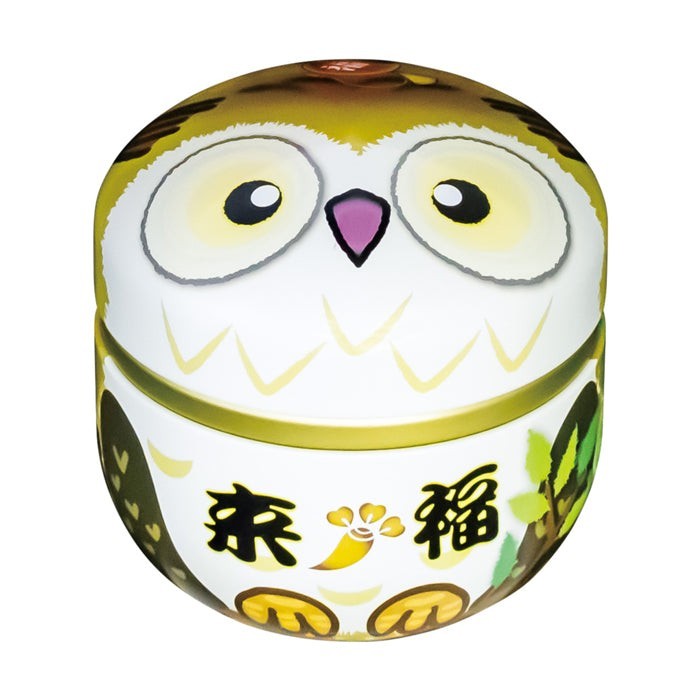 Boîte à thé Yugen lab SUZOKU en fer blanc jaune en forme de hibou avec des détails graphiques et dorés