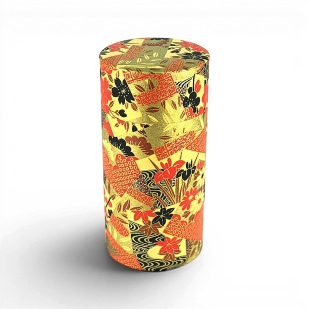 Boîte à thé japonaise Yugen lab cylindrique avec motifs floraux rouges, noirs et dorés pour conserver le thé