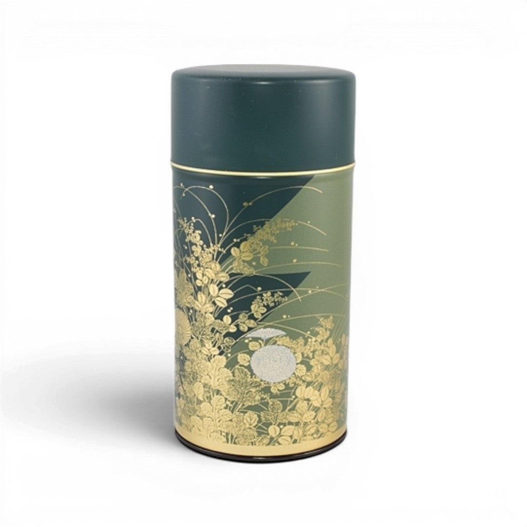 Boîte à thé Yugen lab SHUGA cylindrique en fer blanc vert profond avec motifs végétaux et floraux dorés