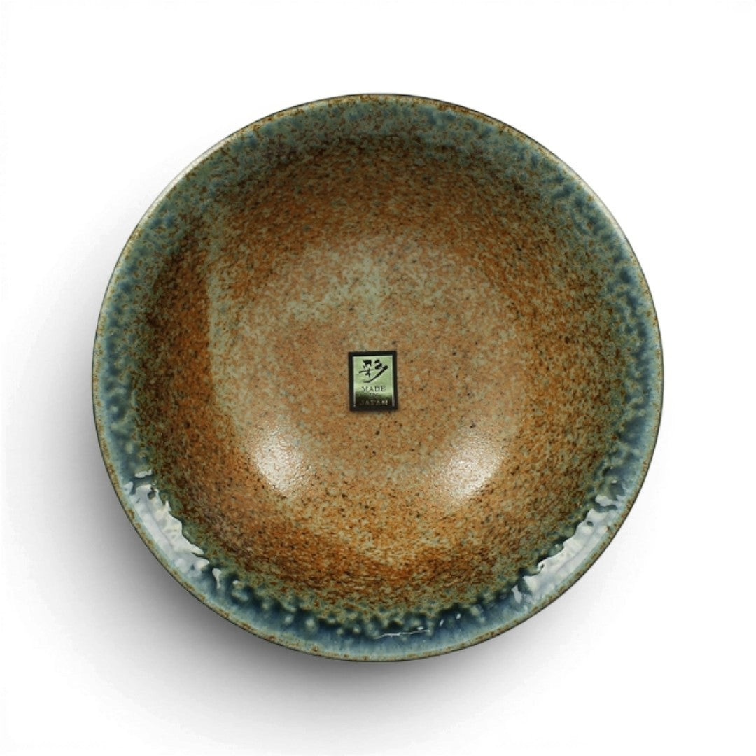Bol japonais Yugen lab en céramique beige et bleu avec un aspect texturé et un bord incurvé, vue de dessus