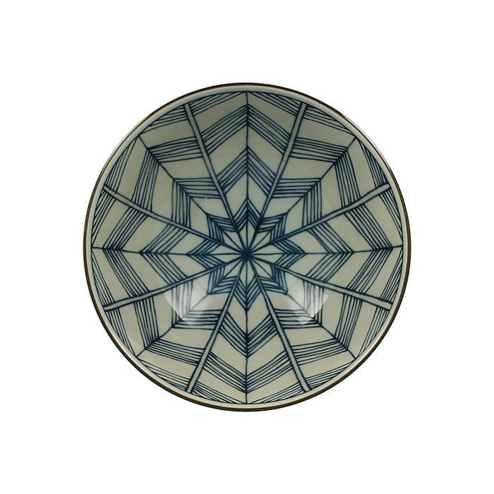 Petit bol japonais Yugen lab en céramique blanche et bleue avec un motif géométrique en forme d'étoile