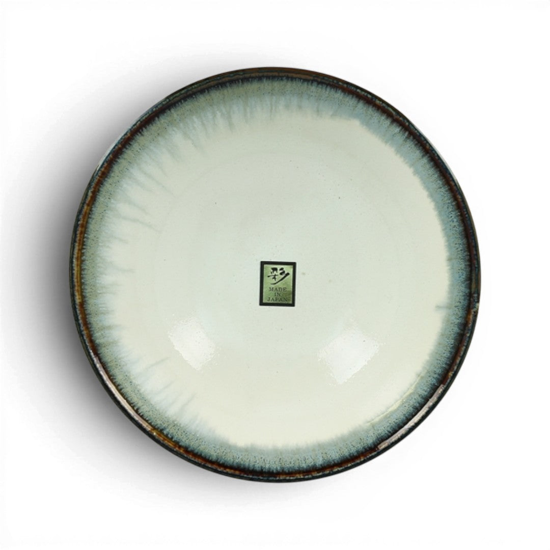 Grand bol japonais en céramique Yugen lab blanc avec bordure effet écume bleue, vue de dessus