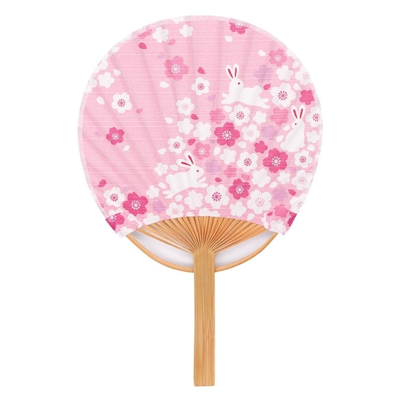 Mini éventail japonais Yugen lab type uchiwa rose avec motif de petits lapins blancs et fleurs de cerisier