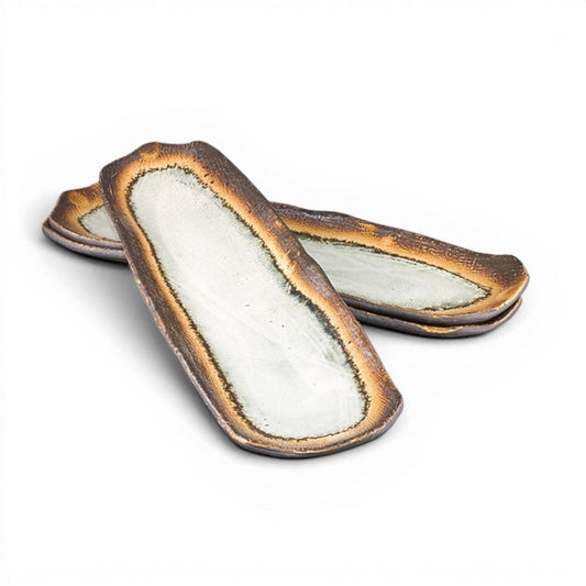 Set de 3 plats longs Yugen lab en céramique japonaise artisanale aux tons marron, jaune et gris