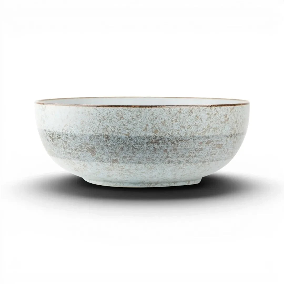 Saladier Yugen lab en céramique japonaise bleutée avec des nuances marron rustiques et un design artisanal élégant