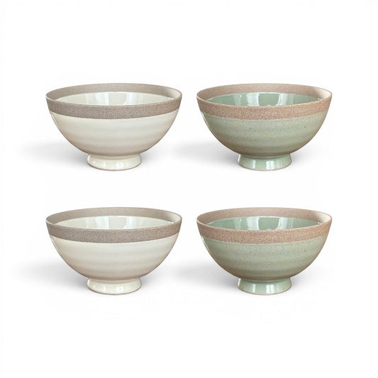 Set de 4 bols japonais Yugen lab en céramique aux teintes pastel avec une bordure brute artisanale.