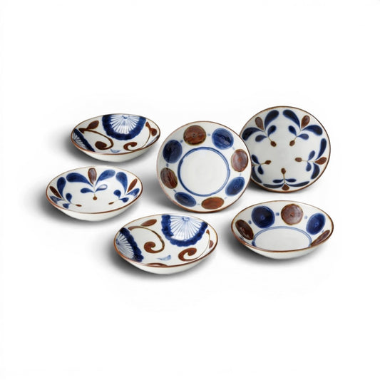 Set de 6 bols Yugen lab en céramique japonaise avec motifs floraux bleus et marron sur fond blanc