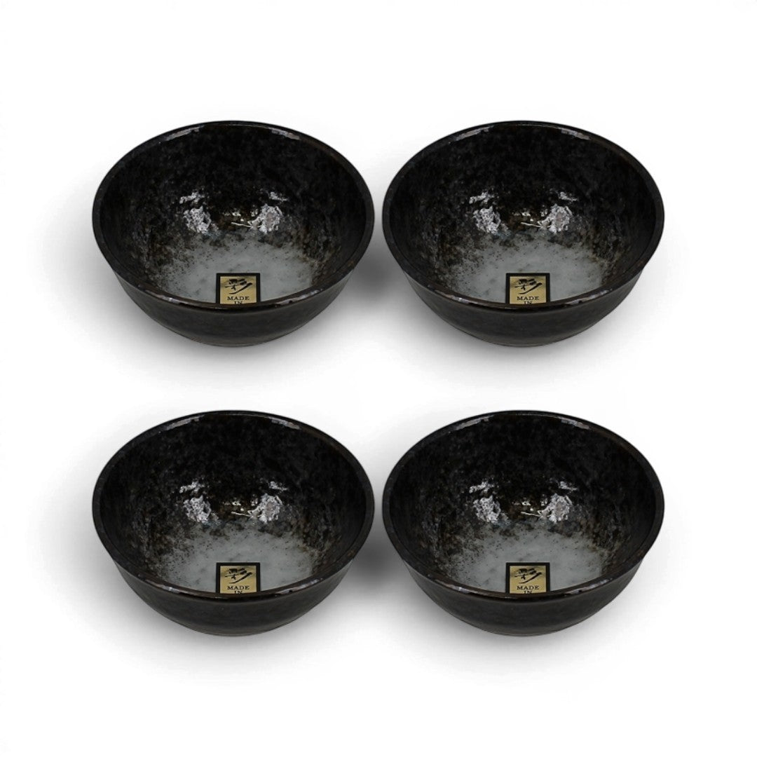 Set de quatre bols japonais Yugen lab en céramique noire brillante au design artisanal et raffiné