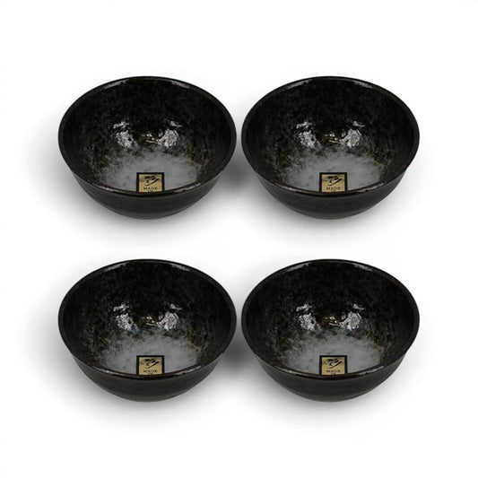 Set de quatre bols japonais Yugen lab en céramique noire brillante au design artisanal et raffiné