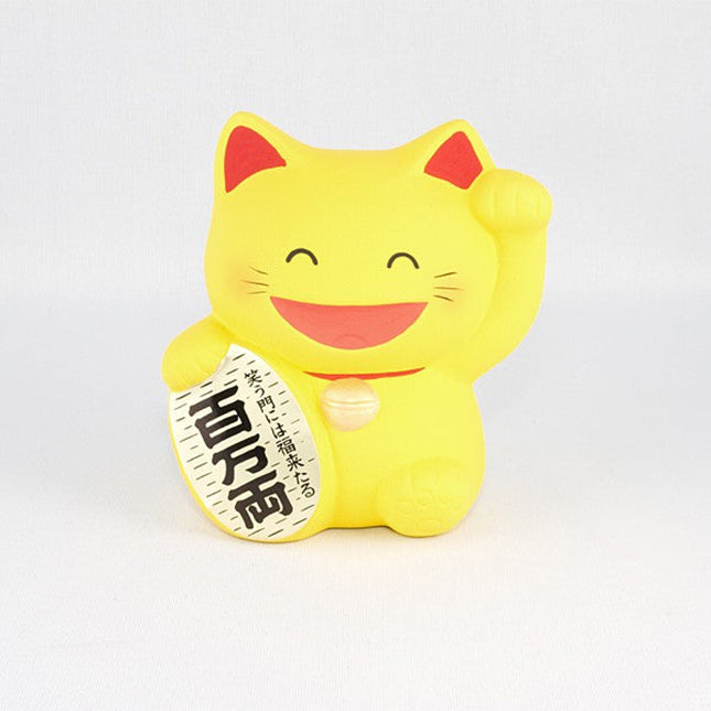 Tirelire chat porte-bonheur Maneki Neko jaune en céramique par Yugen lab avec patte levée pour attirer la chance